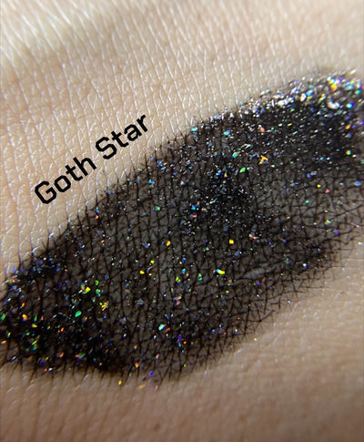 Black Holographic glitter lipgloss magnified 